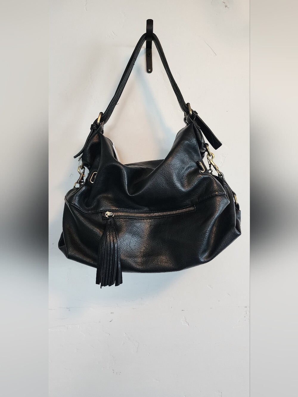 Black Women's Leather Shoulder Bag with Tassel Accent